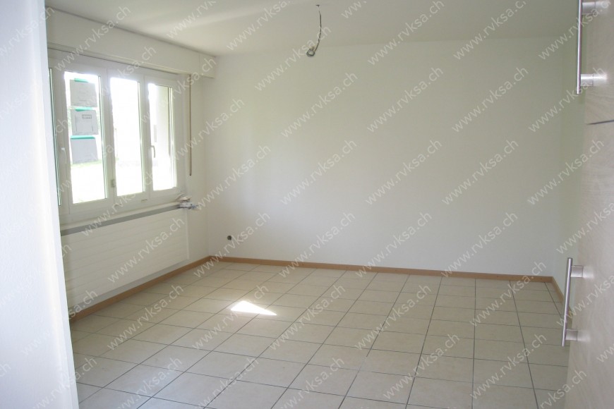 Appartement de 1 pièce, 25 m2, à Cortaillod - Séjour 