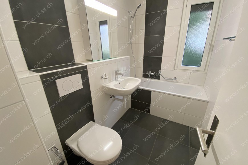 Appartement de 3 pièces, 64 m2, à Cornaux - Séjour 