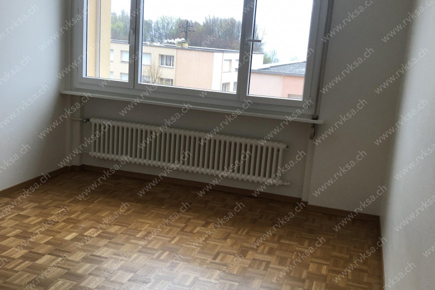 Appartement de 2 pièces, à Hauterive - Chambre N°1 