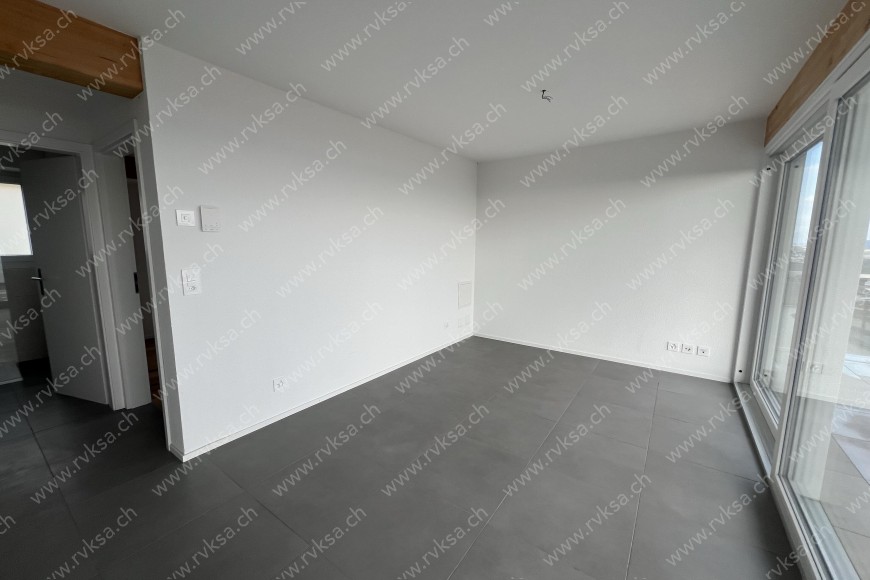 Appartement de 2 pièces, 32.8 m2, à Neuchâtel - Séjour 