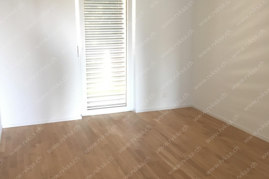Appartement de 3 pièces, 69.9 m2, à Bôle Appartement de 3 pièces, 69.9 m2, à Bôle - Chambre N°1