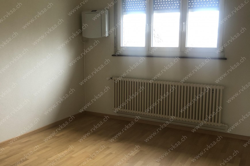 Appartement de 2 pièces, 45 m2, à Bevaix - Chambre N°1 