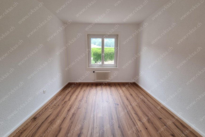 Appartement de 3 pièces, 66 m2, à Les Geneveys-sur-Coffrane - Chambre N°2 