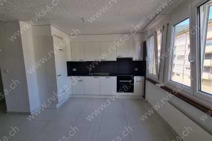 Appartement de 3 pièces, 73 m2, à Les Geneveys-sur-Coffrane - Séjour 